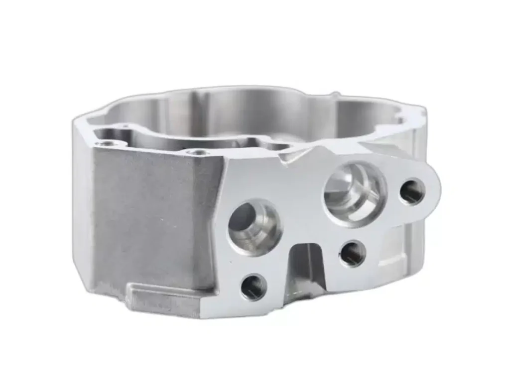 Aluminum engine cylinder part isolated on white background.