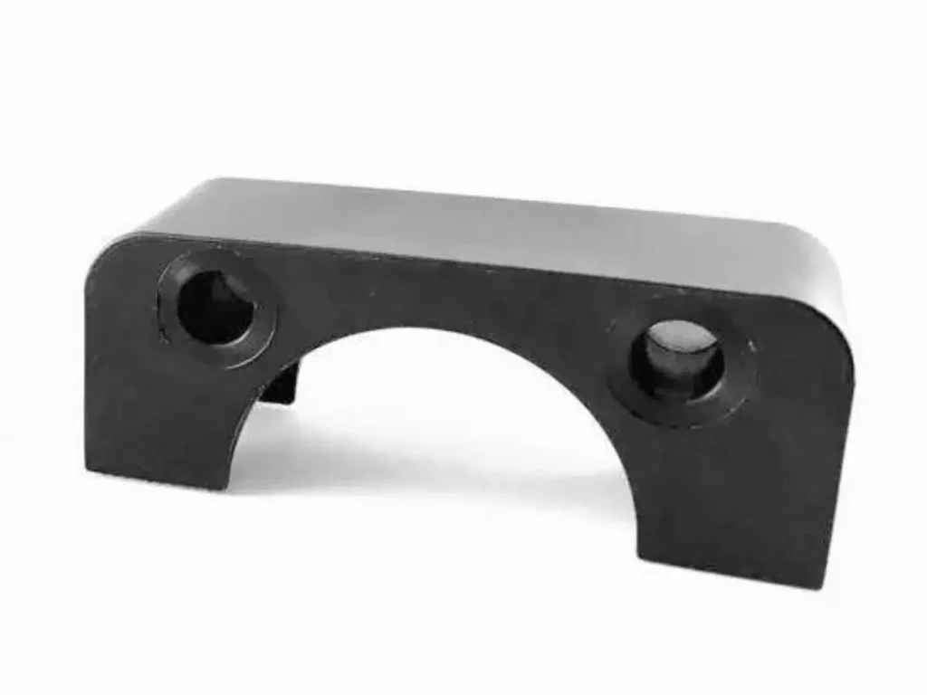 Black metal bracket with two circular holes.