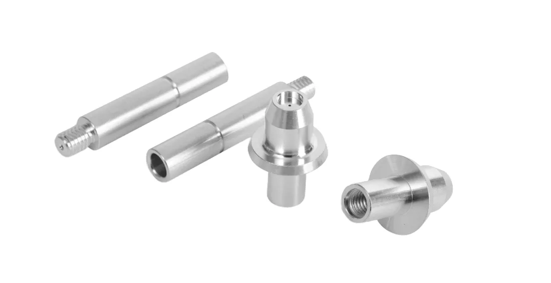 Metal CNC machined parts on white background